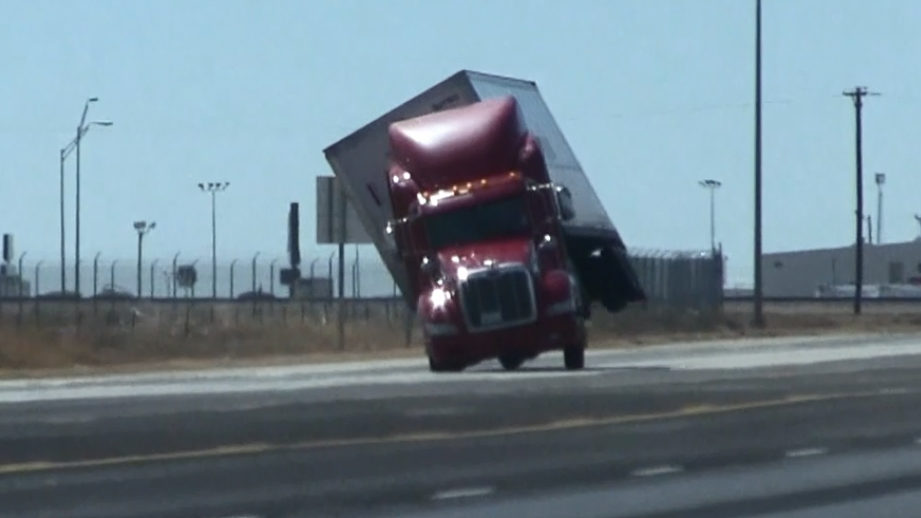 VIDEO Semitruck tossed on its side by 'bomb cyclone' winds...